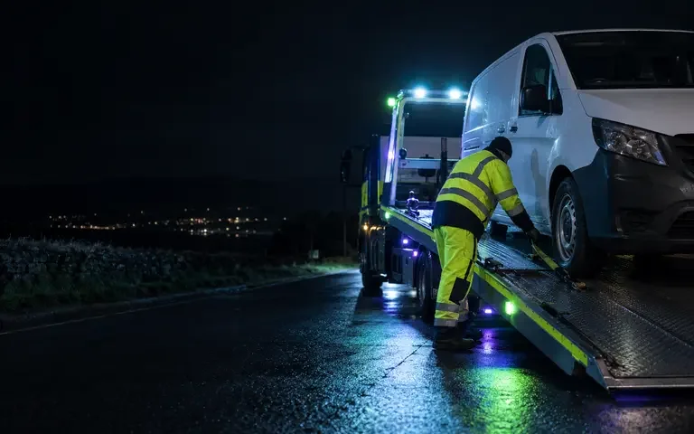 Van recovery — vehicle recovery and transport illustration